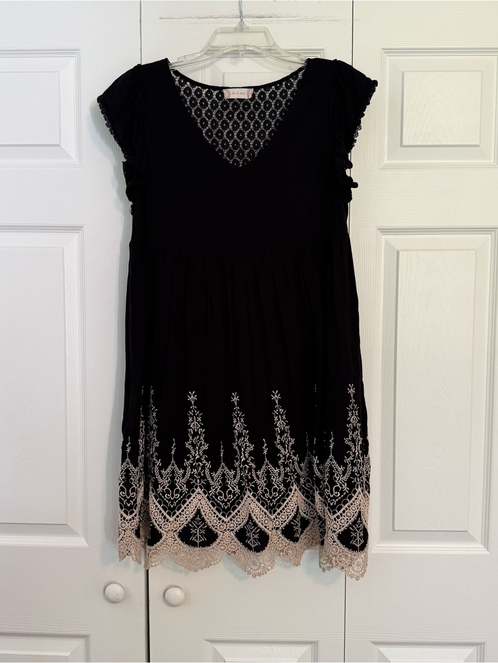 Altar’d State Black Mini Dress with V-Neck and Cream Lace Hem
